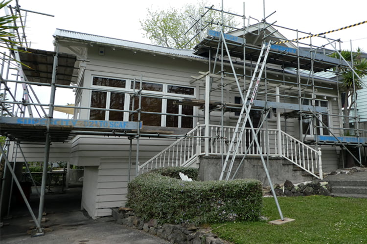 villa with scaffolding